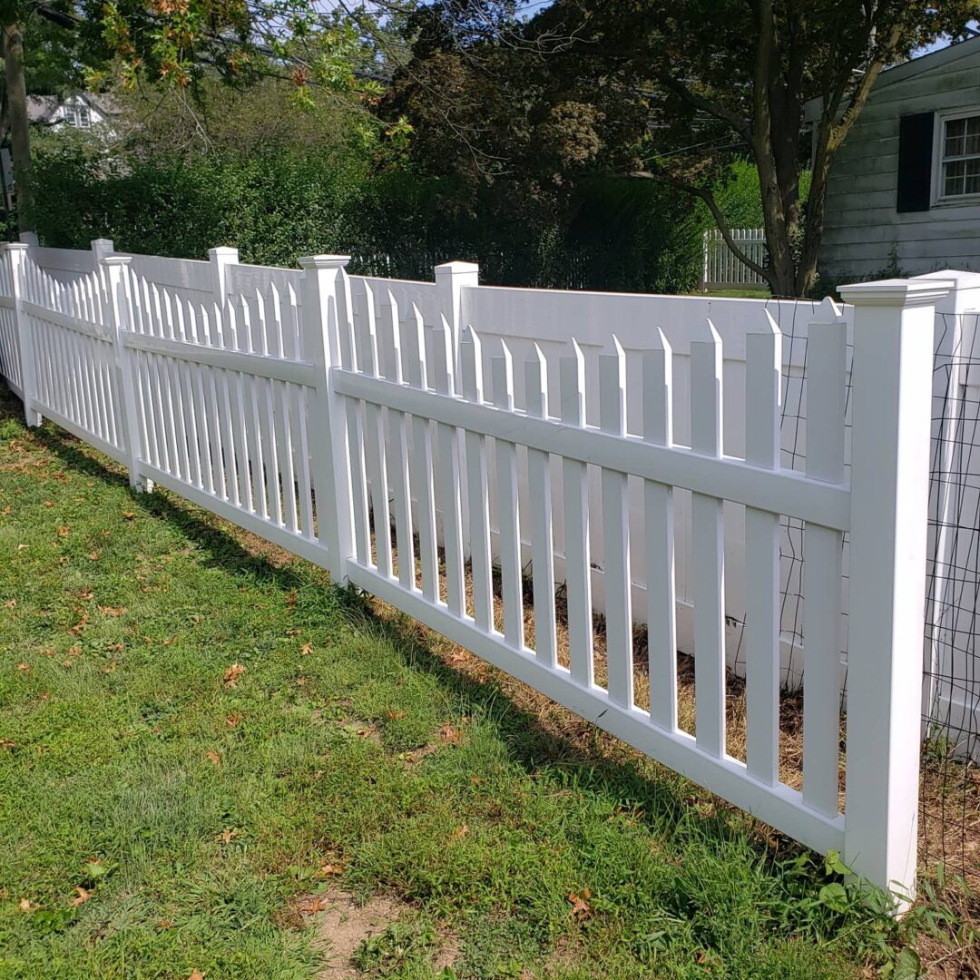 White color fence of a house with the clean paint job