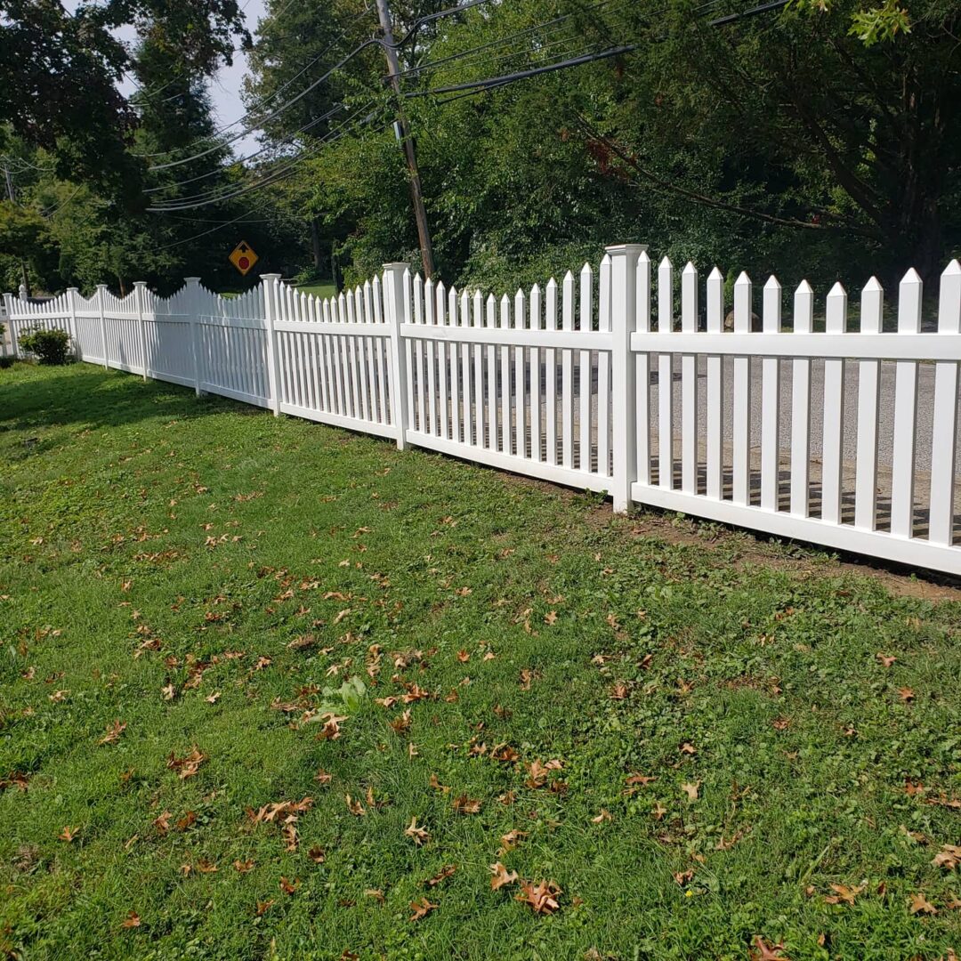 A long fence in a garden for a house