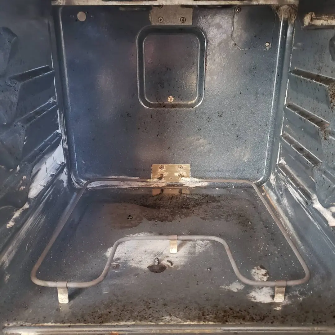 Dirty junk stains and damage in an oven