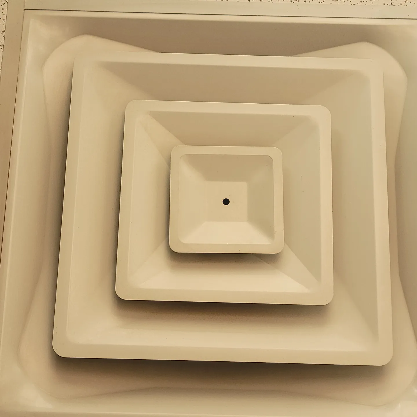 A White Color Cleaned Ceiling Unit